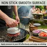 Person pressing hamburger patty on grill with non-stick burger press, BBQ and fresh veggies nearby.
