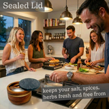 Smiling people cooking in kitchen with bamboo salt box featuring a sealed lid, keeping herbs fresh.