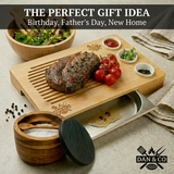 Bamboo carving board with steak, tomatoes, dipping bowls, salad, kitchen salt box, perfect gift idea.