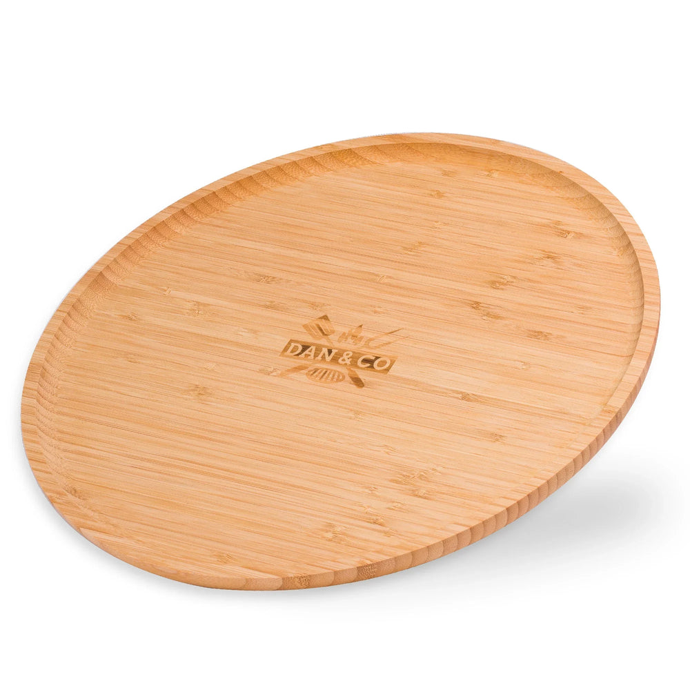 Large round bamboo wooden serving tray with engraved center, smooth surface and rim