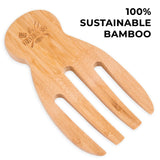 Bamboo wooden salad server fork made from sustainable bamboo on a white background.